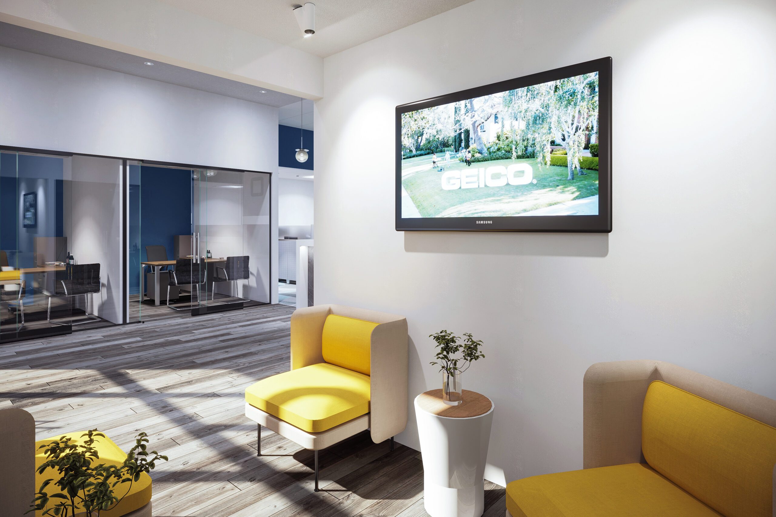 Modern Geico office lounge and waiting area in Saugus, MA featuring branded workplace interiors, glass conference rooms, and contemporary collaborative seating.<br />
