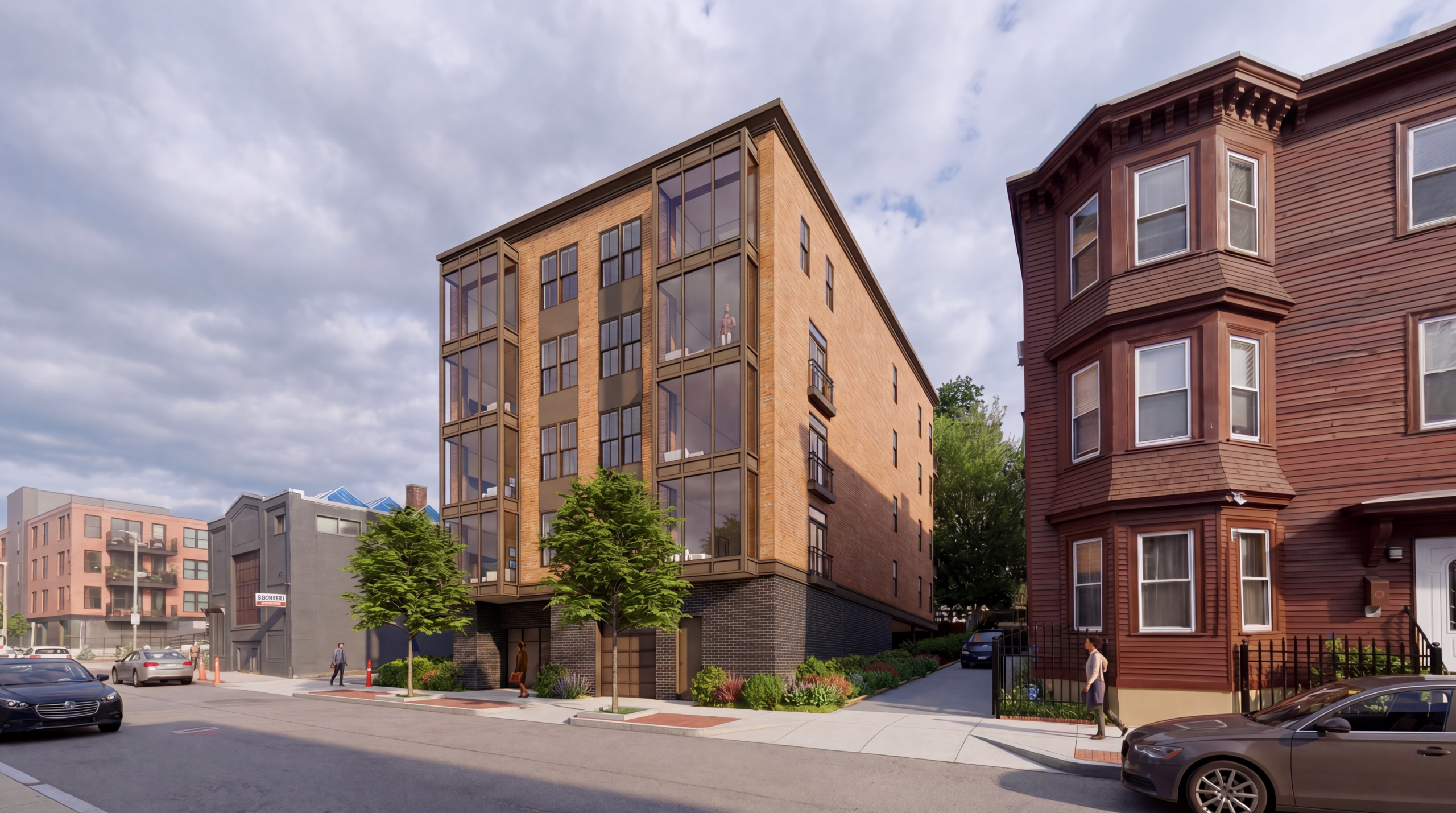 Contemporary multifamily development with expansive glass corners, brick façade, and modern urban infill design in a Boston neighborhood streetscape