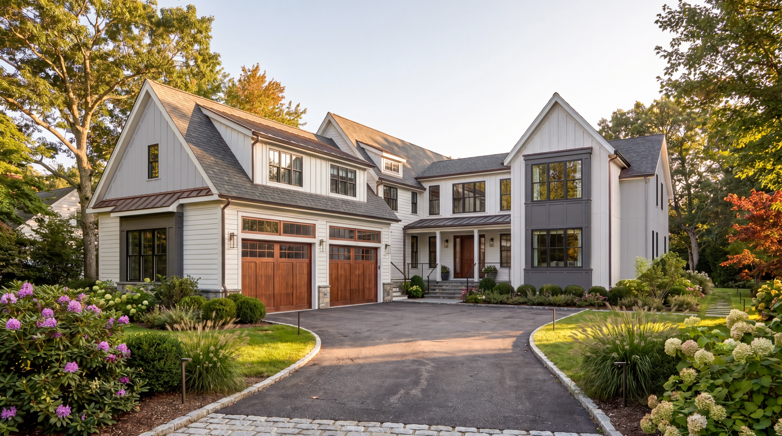 Luxury single-family residence featuring modern farmhouse architecture, board-and-batten siding, black-framed windows, wood garage doors, and professionally landscaped grounds in a suburban neighborhood.