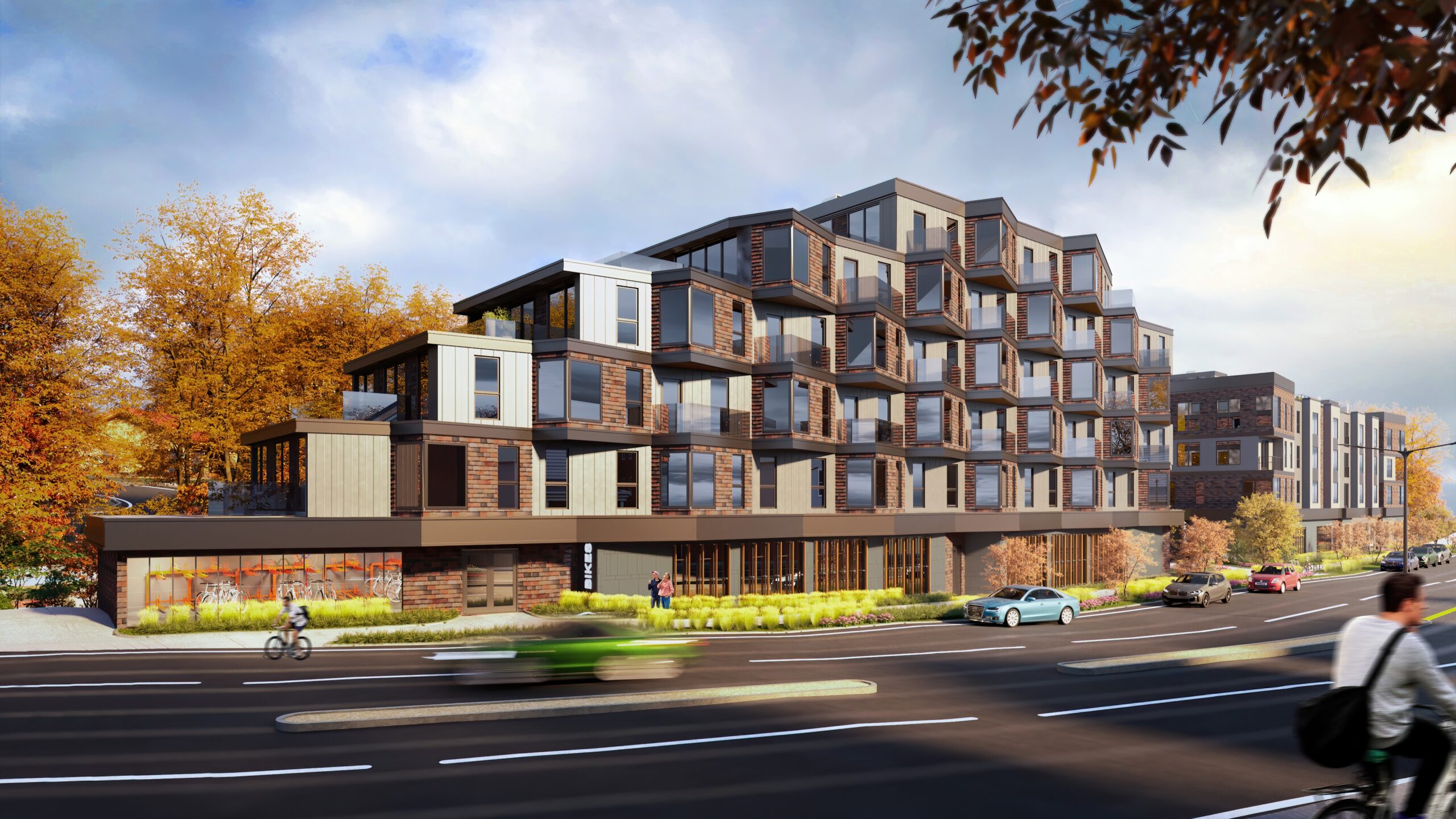Street-level rendering of a 50,000 SF mixed-use development in East Boston, MA featuring ground-floor retail, modern residential architecture, balconies, and urban streetscape design.